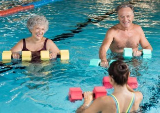 adults in the pool doing aquafit