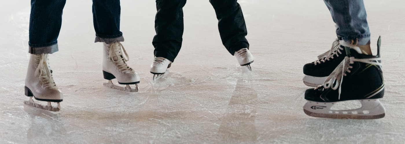 Close up of three pair of ice skates