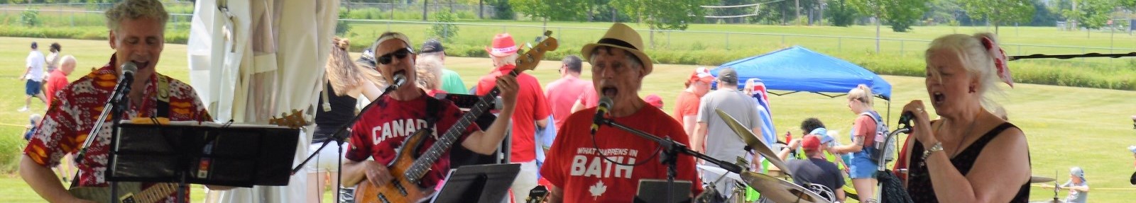 people playing music in a band outdoors