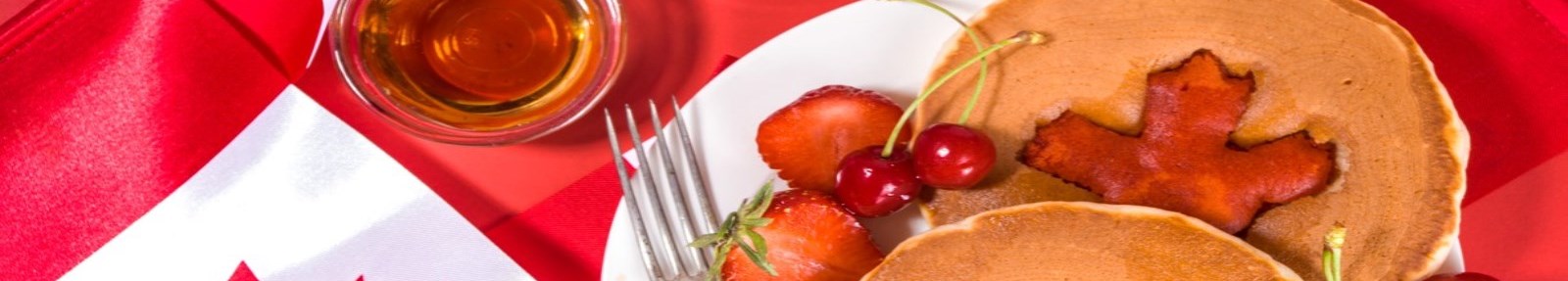 pancakes with a maple leaf and a fork