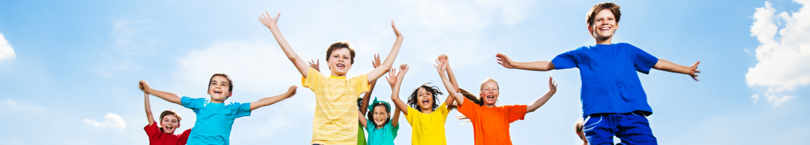 happy children against a blue sky background