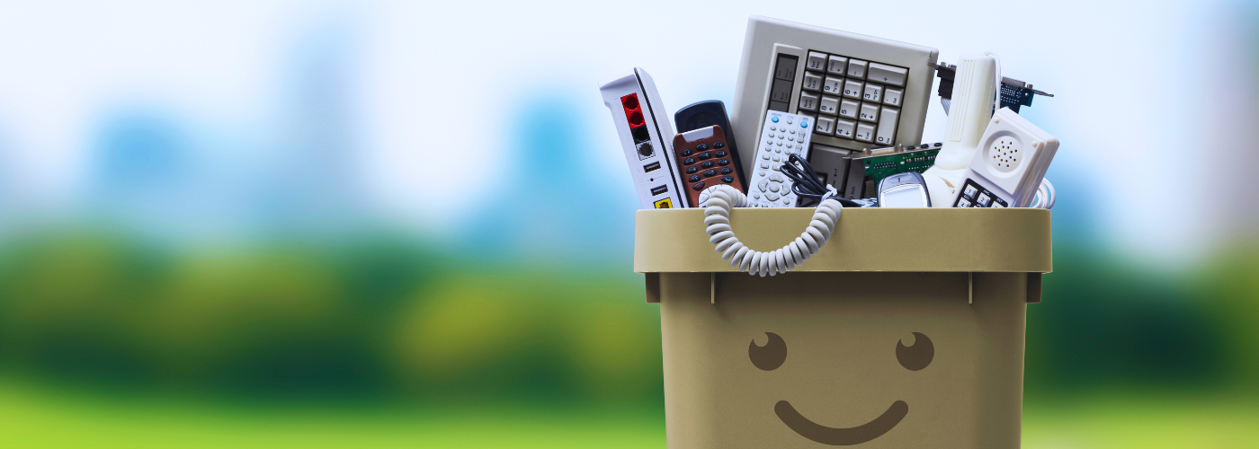 Image of a smiling e-waste bin. 