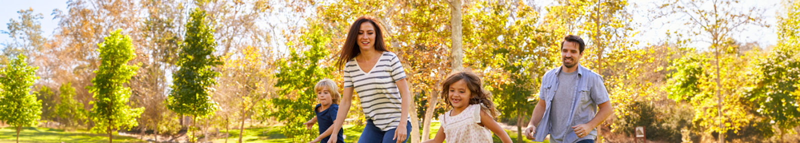 Family playing in a park