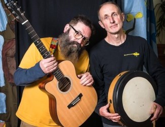 two men with a guitar and tambourine