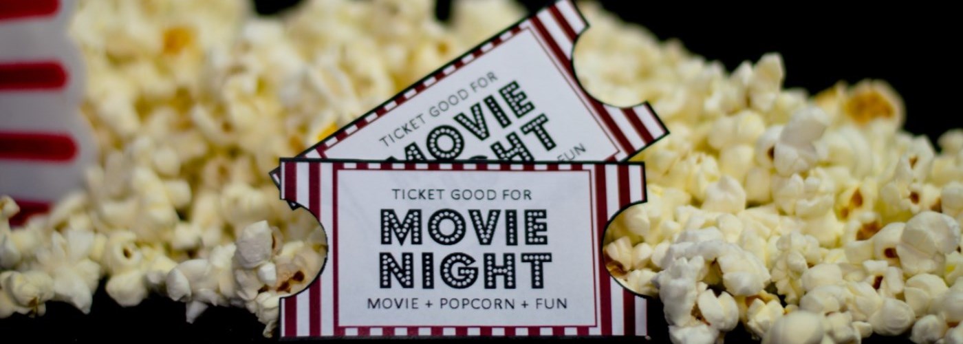 popcorn with a movie ticket