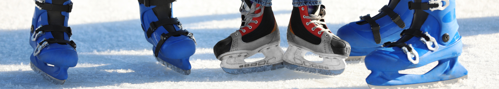 ice skates close up on ice outdoors