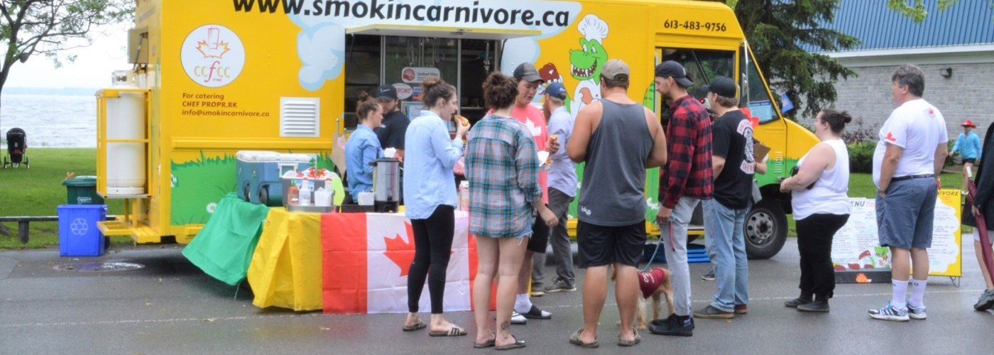 food truck with people queuing