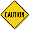 caution on yellow background
