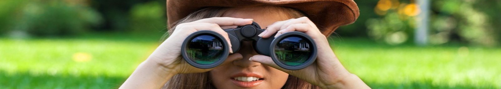 Girl using binoculars