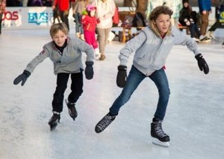 young boys ice skating