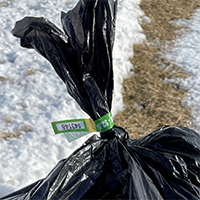 Garbage bag with bag tag