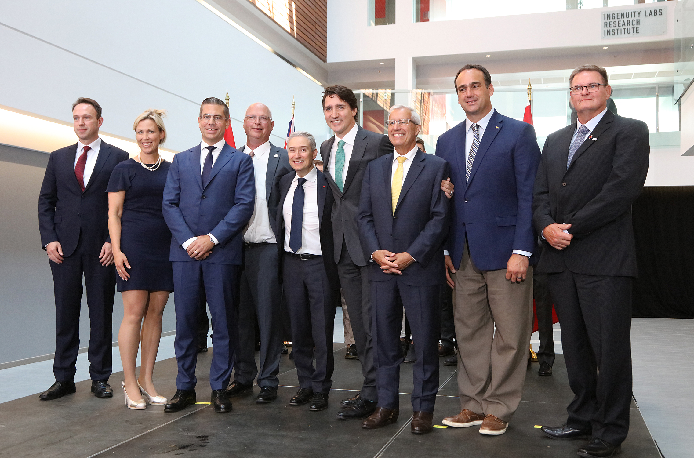 From left, Belgium’s Ambassador to Canada, Patrick Van Gheel, MP Shelby Kramp, MPP Ric Bresee, Mathias Miedreich, CEO of Umicore, and his wife, Prime Minister Justin Trudeau, François-Philippe Champagne, Minister of Innovation, Science and Industry, Vic Fedeli, Minister of Economic Development, Job Creation and Trade, MP Mark Gerretsen, and Jim Hegadorn, Deputy Mayor Loyalist Township, announcing the new plant. 
