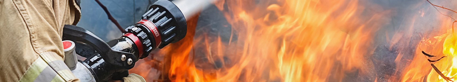 Firefighter battling a fire 