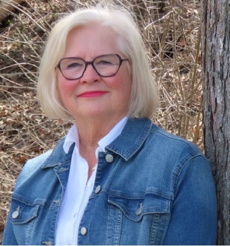 woman with glasses and white hair