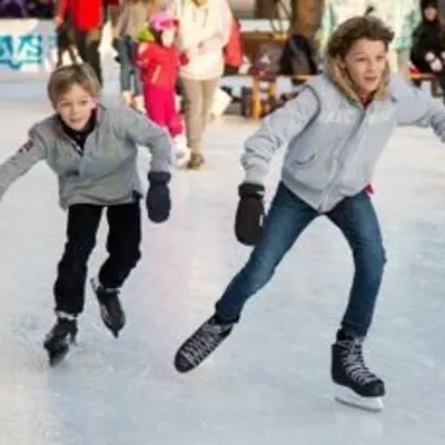young boys ice skating