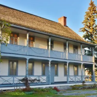 Historic house sitting in parkland