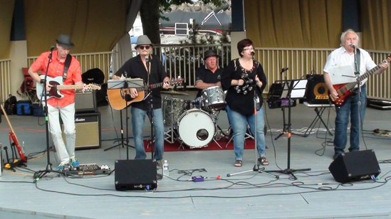 band performing on outdoor stage