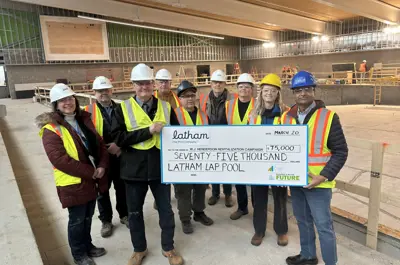 Cheque presentation from Latham representatives to Loyalist Township representatives