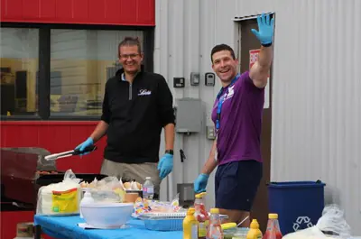 Staff waving