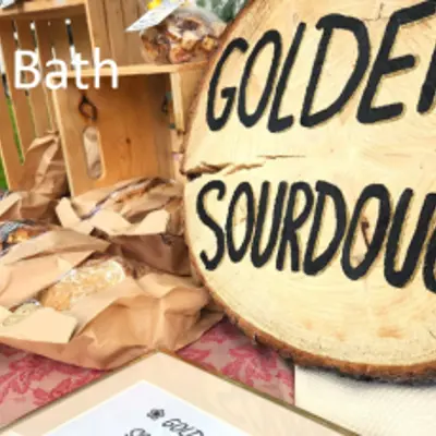 golden sourdough sign in Bath market