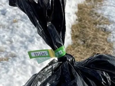 garbage bag with tag