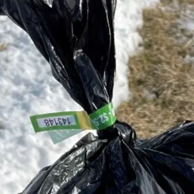 garbage bag with tag